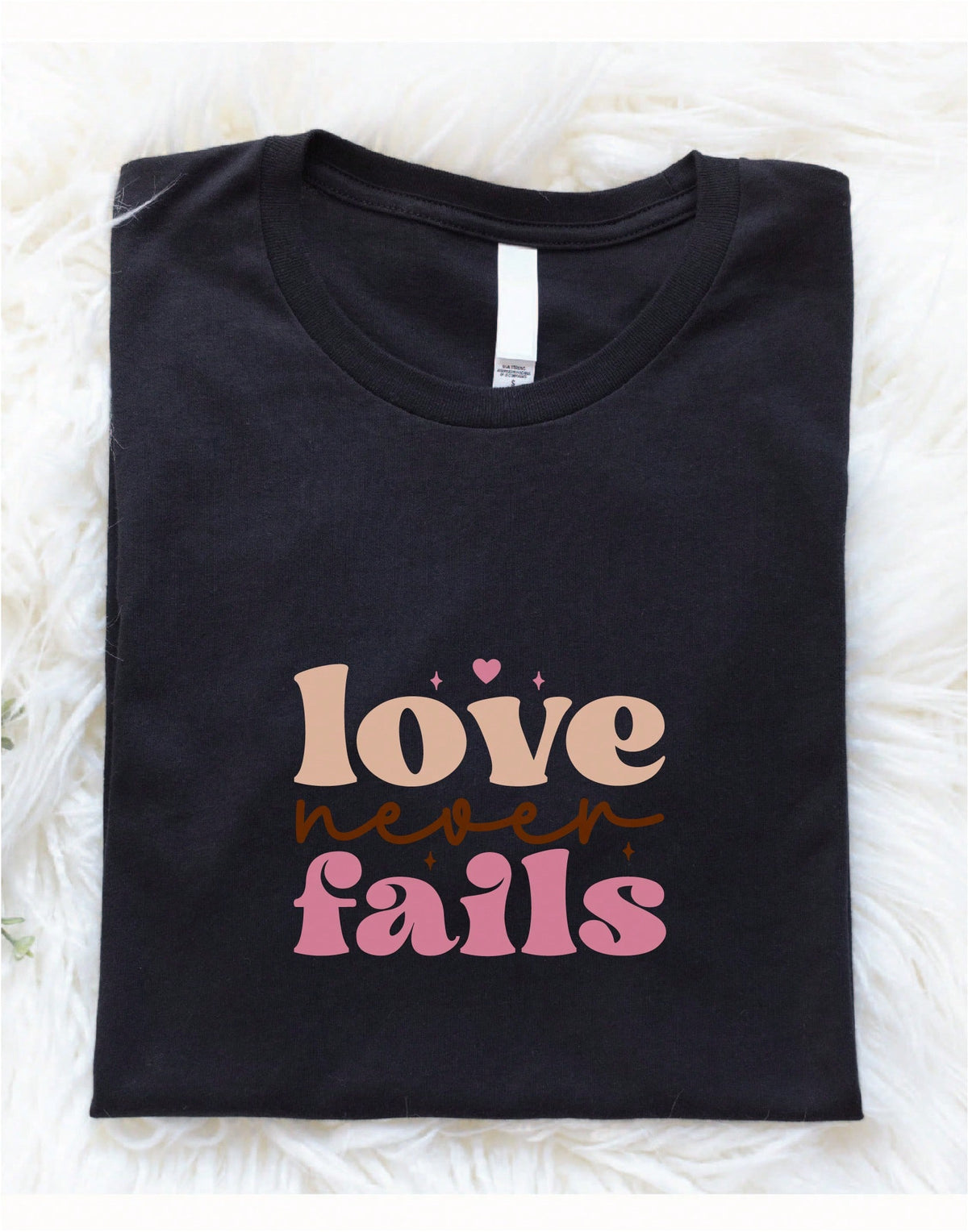 Love Never Fails T-Shirt