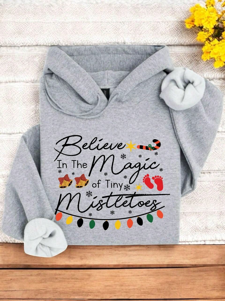 Believe In The Magic Of Tiny Mistletoes Hoodie